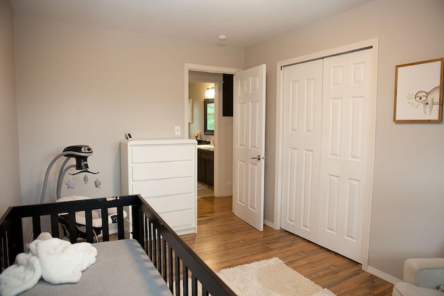 6014 6th St, Lake Park, MN 56554 - bedroom with light wood-type flooring, baseboards, and a closet