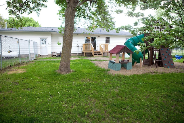 6014 6th St, Lake Park, MN 56554 - rear view of house featuring a playground