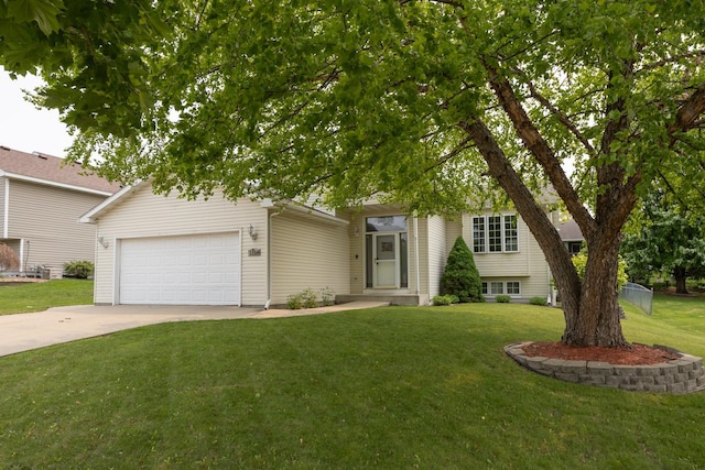 3224 48th St NW, Rochester, MN 55901 - view of front of property with driveway, a garage, and a front lawn