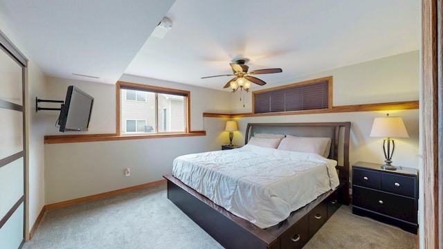 3224 48th St NW, Rochester, MN 55901 - carpeted bedroom with baseboards and ceiling fan
