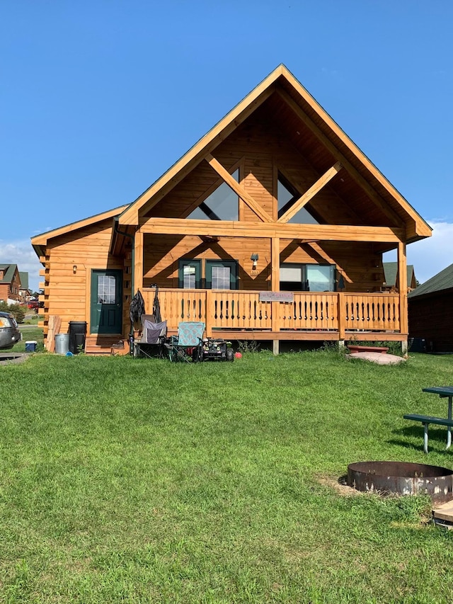 303 Hilltop Ct, Warrens, WI 54666 - rear view of house featuring a yard and a deck