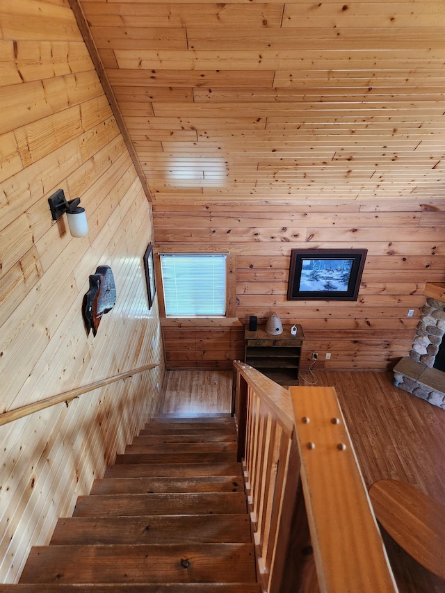 303 Hilltop Ct, Warrens, WI 54666 - stairs with wood-type flooring and wooden walls