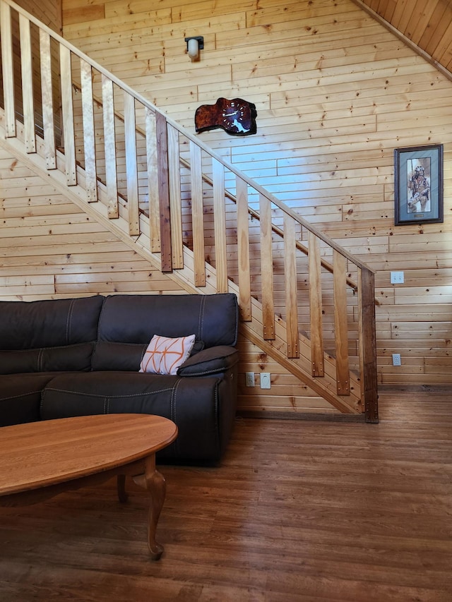 303 Hilltop Ct, Warrens, WI 54666 - stairs featuring wood walls and wood finished floors
