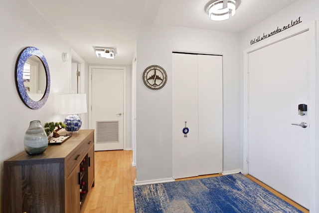 121 Washington Ave S Unit 1816, Minneapolis, MN 55401 - entrance foyer with light wood finished floors and baseboards