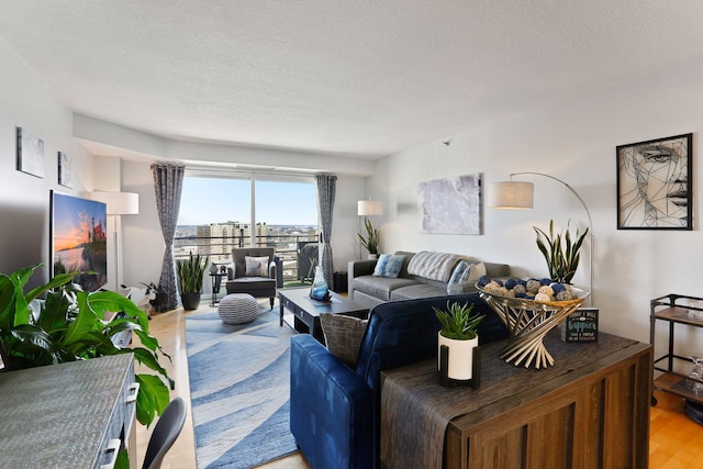 121 Washington Ave S Unit 1816, Minneapolis, MN 55401 - living area featuring light wood-style flooring and a textured ceiling