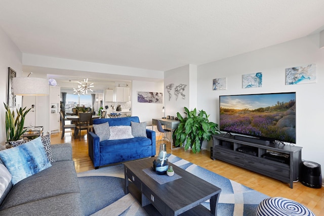 121 Washington Ave S Unit 1816, Minneapolis, MN 55401 - living room featuring light wood-type flooring and a chandelier