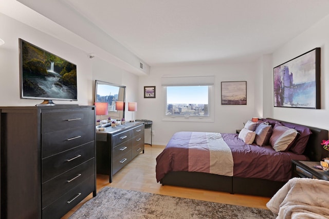 121 Washington Ave S Unit 1816, Minneapolis, MN 55401 - bedroom featuring light wood-style floors