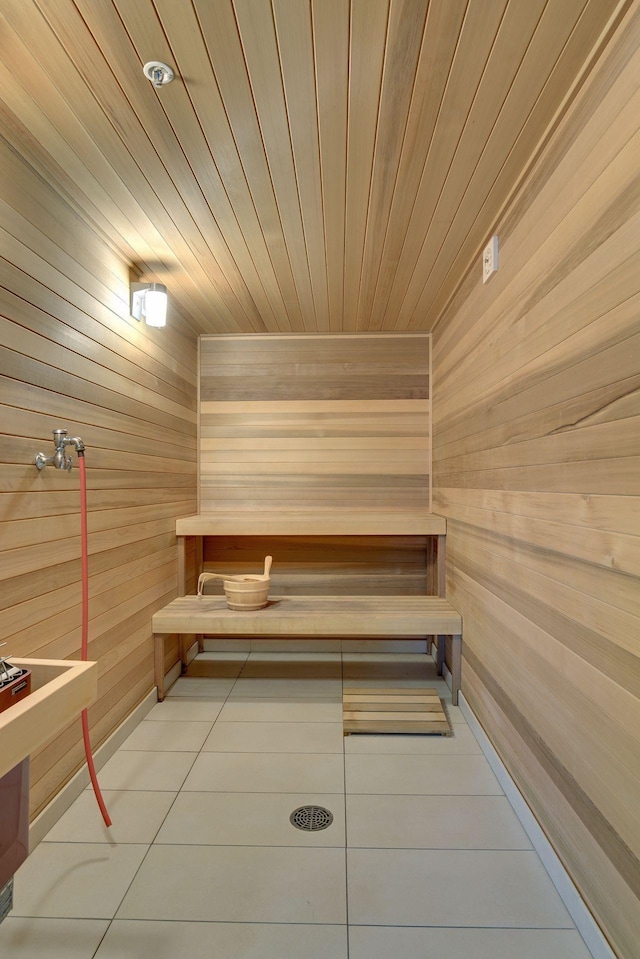 121 Washington Ave S Unit 1816, Minneapolis, MN 55401 - relaxing sauna featuring wood walls, wood ceiling, and tile patterned flooring