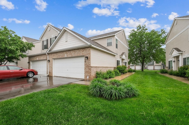 6574 154th St W Unit 118, Apple Valley, MN 55124 - view of property exterior featuring brick siding, a lawn, concrete driveway, and a garage