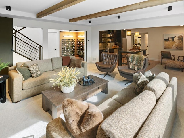16695 Manor Rd, Eden Prairie, MN 55343 - living room featuring stairway, light carpet, baseboards, and beam ceiling