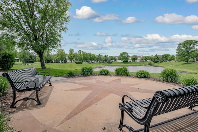 10465 172nd Ln NW, Elk River, MN 55330 - view of patio / terrace with a water view and view of wooded area