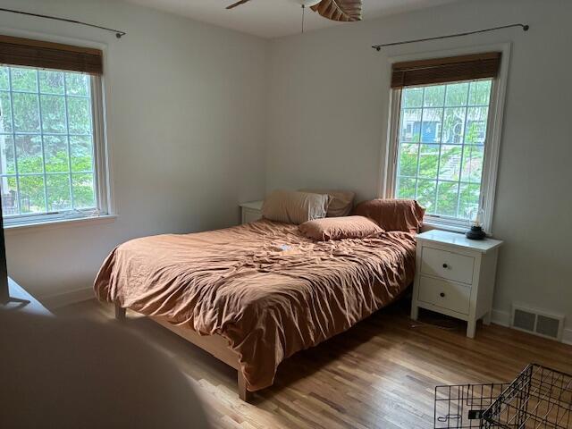 4901 Bryant Ave S, Minneapolis, MN 55419 - bedroom featuring baseboards, wood finished floors, and a ceiling fan