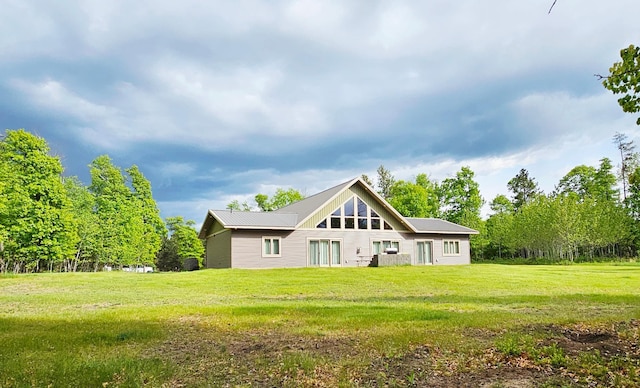20470 220th St, Verndale, MN 56481 - rear view of house with a yard and metal roof