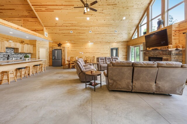 20470 220th St, Verndale, MN 56481 - living room featuring wood ceiling, high vaulted ceiling, concrete flooring, recessed lighting, and ceiling fan