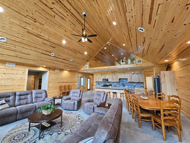 20470 220th St, Verndale, MN 56481 - living area featuring wooden ceiling, vaulted ceiling, wood walls, ceiling fan, and recessed lighting