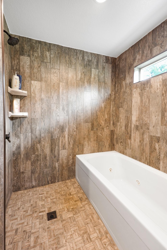 20470 220th St, Verndale, MN 56481 - bathroom with a garden tub, wooden walls, and a tile shower