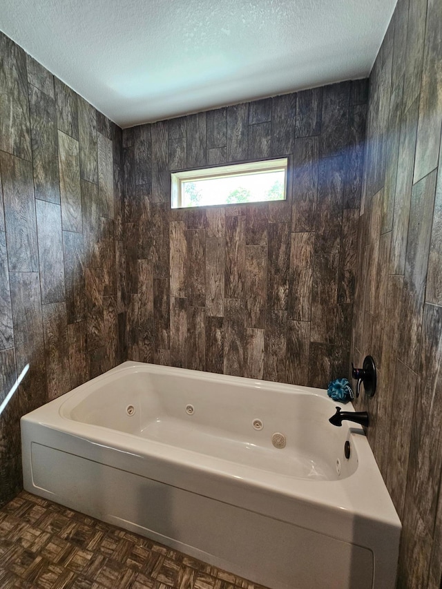 20470 220th St, Verndale, MN 56481 - full bathroom with a tub with jets and a textured ceiling