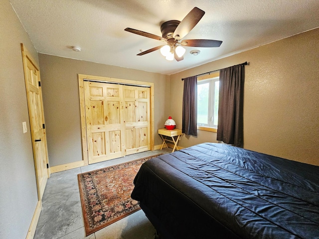 20470 220th St, Verndale, MN 56481 - bedroom with ceiling fan, baseboards, and a textured ceiling