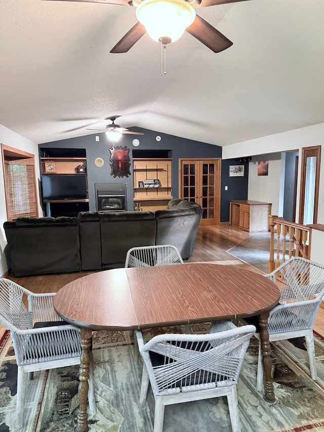 33688 416th Ave, Farm Island Twp, MN 56431 - dining area with ceiling fan, lofted ceiling, french doors, and wood finished floors