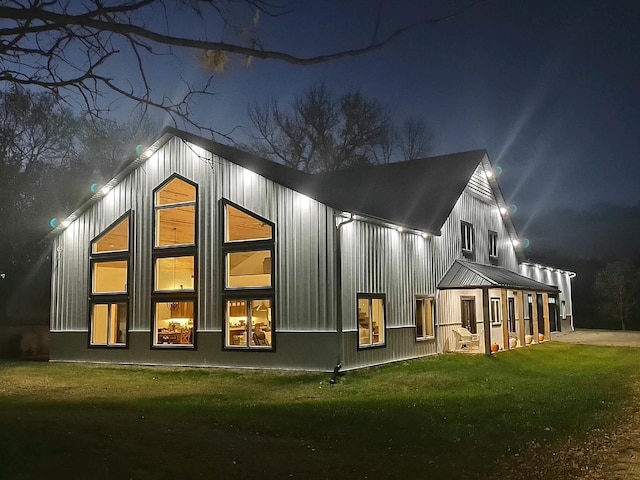51509 County Highway 9, Scambler Twp, MN 56572 - back of house at twilight with a yard
