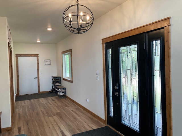 51509 County Highway 9, Scambler Twp, MN 56572 - foyer entrance featuring a chandelier, wood finished floors, baseboards, and recessed lighting