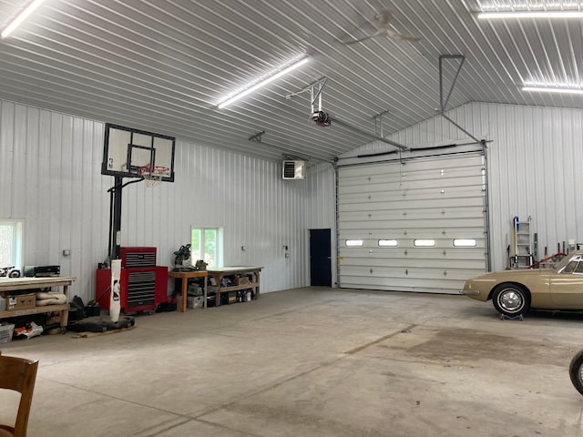 51509 County Highway 9, Scambler Twp, MN 56572 - garage featuring a workshop area and metal wall