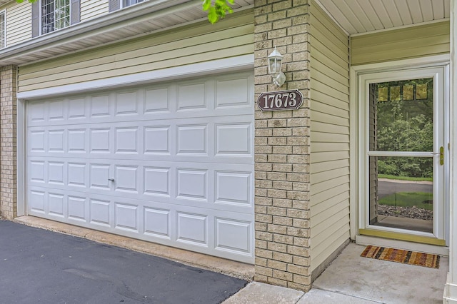 17673 96th Ave N, Maple Grove, MN 55311 - garage with asphalt driveway