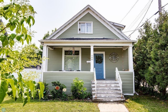 108 6th Ave N, Fargo, ND 58102 - view of front facade featuring covered porch