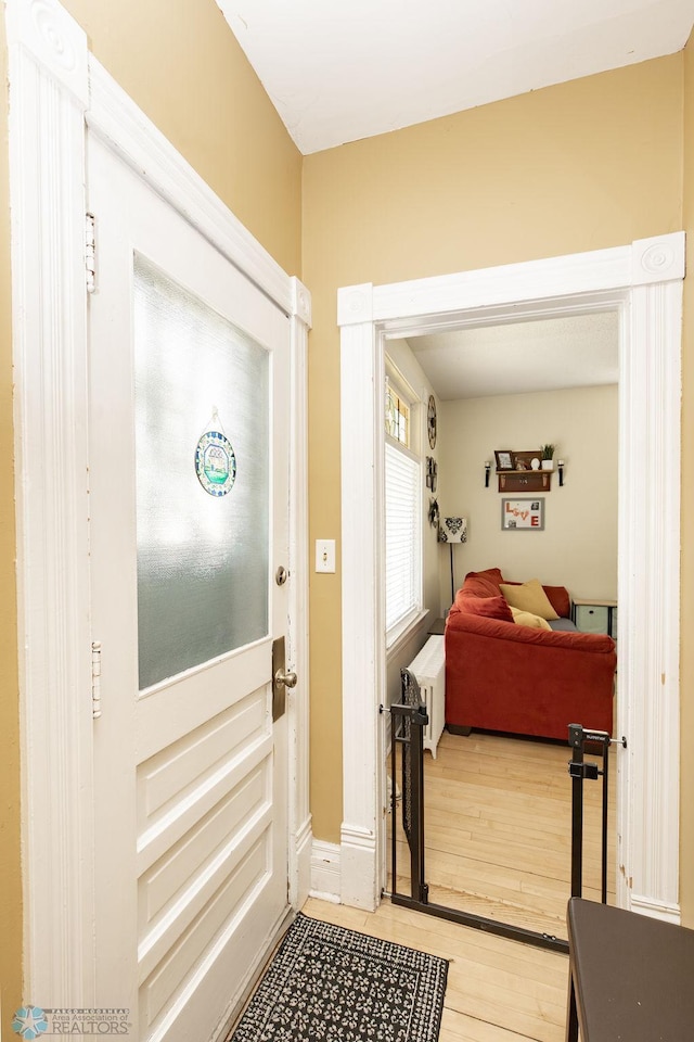 108 6th Ave N, Fargo, ND 58102 - entryway with light wood finished floors and baseboards