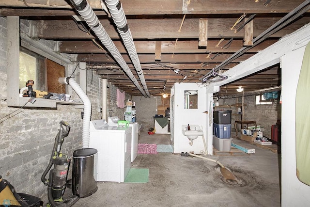 108 6th Ave N, Fargo, ND 58102 - unfinished basement with washing machine and dryer and a sink