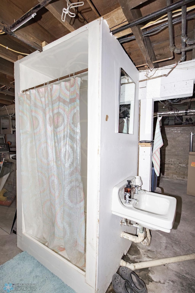 108 6th Ave N, Fargo, ND 58102 - unfinished below grade area featuring a sink