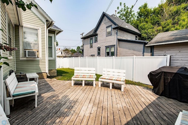 108 6th Ave N, Fargo, ND 58102 - wooden terrace with a fenced backyard and cooling unit