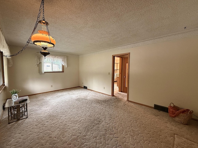1620 4th St, Montevideo, MN 56265 - carpeted empty room with a textured ceiling and baseboards