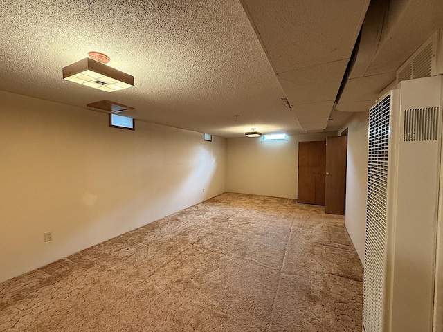 1620 4th St, Montevideo, MN 56265 - finished below grade area featuring a heating unit and carpet