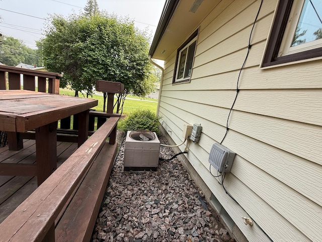 1620 4th St, Montevideo, MN 56265 - wooden terrace with central air condition unit