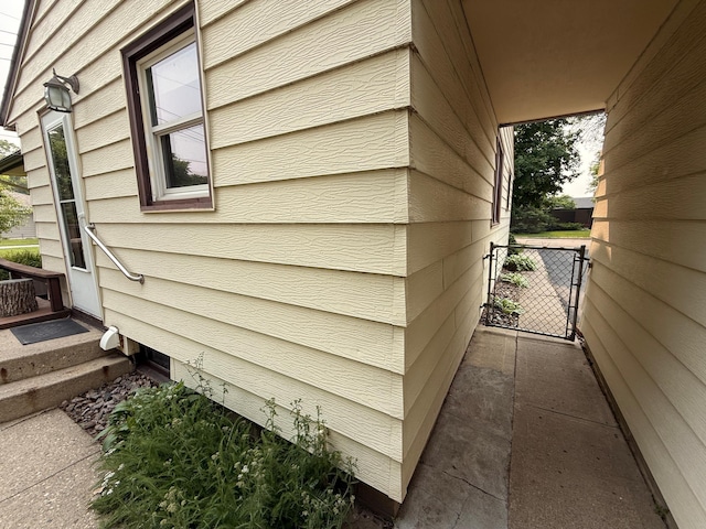 1620 4th St, Montevideo, MN 56265 - view of property exterior with a gate