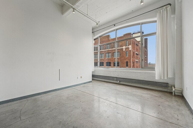 700 Washington Ave N Unit 601, Minneapolis, MN 55401 - spare room with concrete floors and baseboards