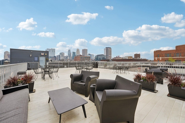 700 Washington Ave N Unit 601, Minneapolis, MN 55401 - view of patio / terrace featuring a view of skyline and outdoor dining space