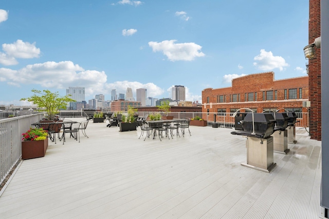 700 Washington Ave N Unit 601, Minneapolis, MN 55401 - view of patio / terrace with outdoor dining area and a view of skyline