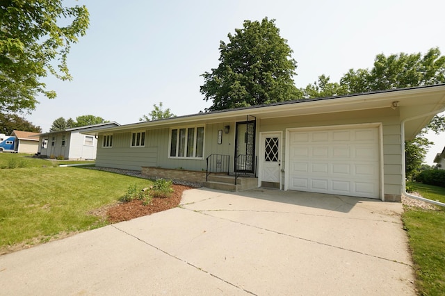 2805 12th Ave NW, Willmar, MN 56201 - single story home featuring a garage, concrete driveway, and a front lawn