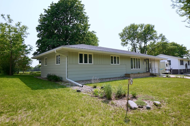 2805 12th Ave NW, Willmar, MN 56201 - single story home featuring board and batten siding and a front lawn