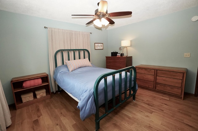2805 12th Ave NW, Willmar, MN 56201 - bedroom featuring wood finished floors and ceiling fan