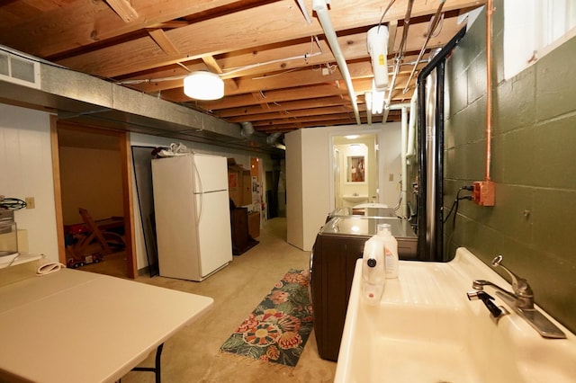 2805 12th Ave NW, Willmar, MN 56201 - basement featuring freestanding refrigerator and a sink