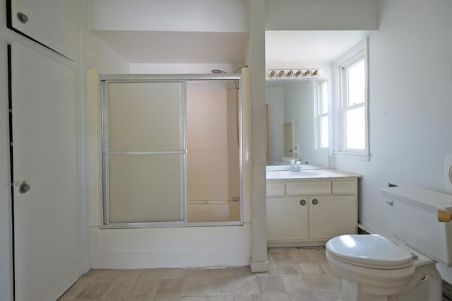 5741 Maple St, Rockford, MN 55373 - full bath with toilet, vanity, and enclosed tub / shower combo
