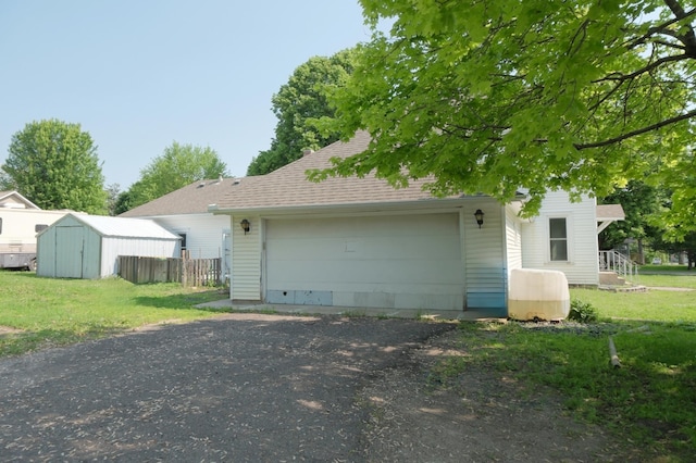 5741 Maple St, Rockford, MN 55373 - view of front facade with roof with shingles and a garage