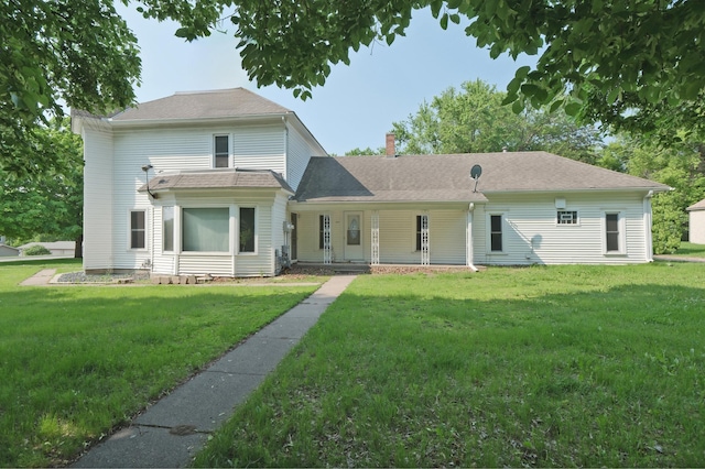 5741 Maple St, Rockford, MN 55373 - back of house featuring a yard, a chimney, and a porch