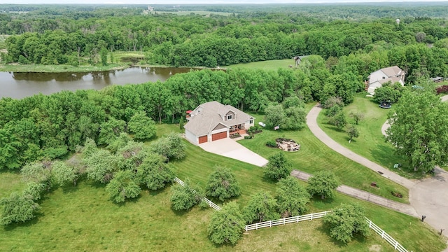 22774 Olivine St NW, Nowthen, MN 55330 - drone / aerial view of a heavily wooded area and a nearby body of water