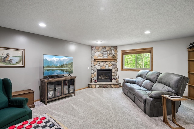 22774 Olivine St NW, Nowthen, MN 55330 - living room with carpet floors, recessed lighting, a textured ceiling, a stone fireplace, and baseboards