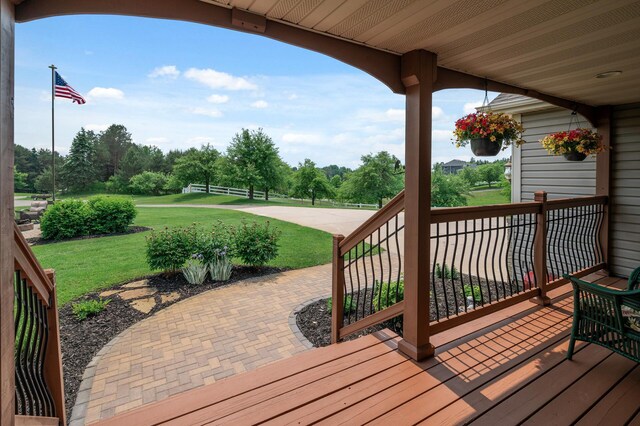 22774 Olivine St NW, Nowthen, MN 55330 - wooden deck featuring a lawn and view of wooded area