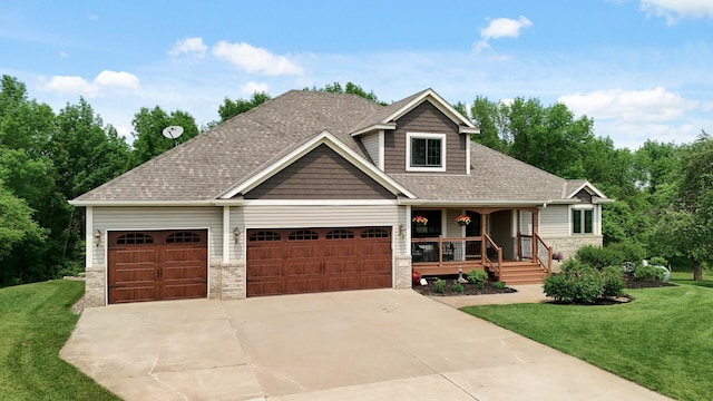 22774 Olivine St NW, Nowthen, MN 55330 - craftsman-style house with a porch, a front lawn, driveway, and a garage